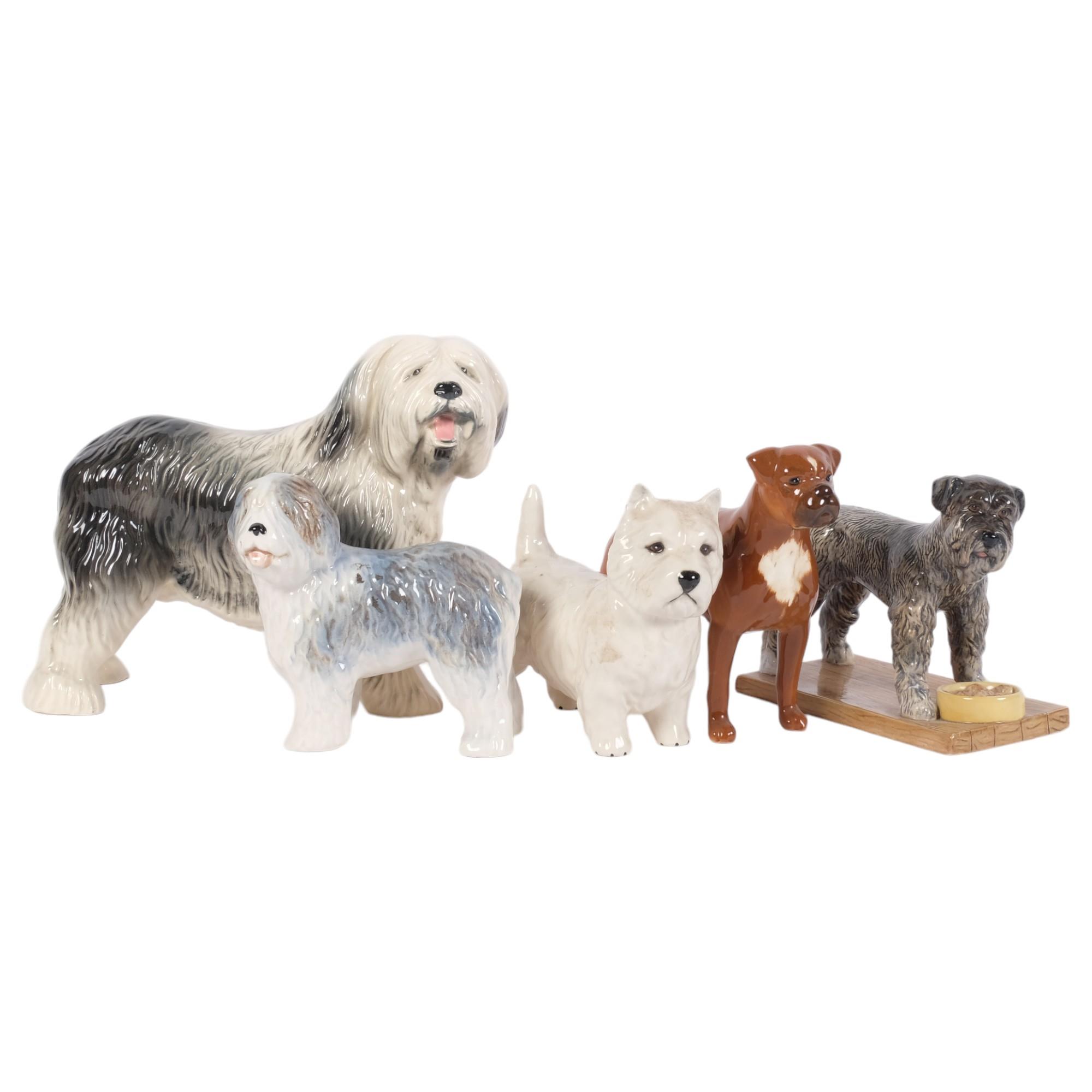 5 ceramic dogs, including Royal Doulton Standard Schnauzer, and a Beswick West Highland Terrier,
