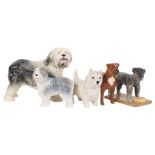 5 ceramic dogs, including Royal Doulton Standard Schnauzer, and a Beswick West Highland Terrier,