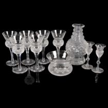 A set of 6 cut-crystal thistle-shape wine glasses, 15.5cm, a cut-glass decanter, a pair of