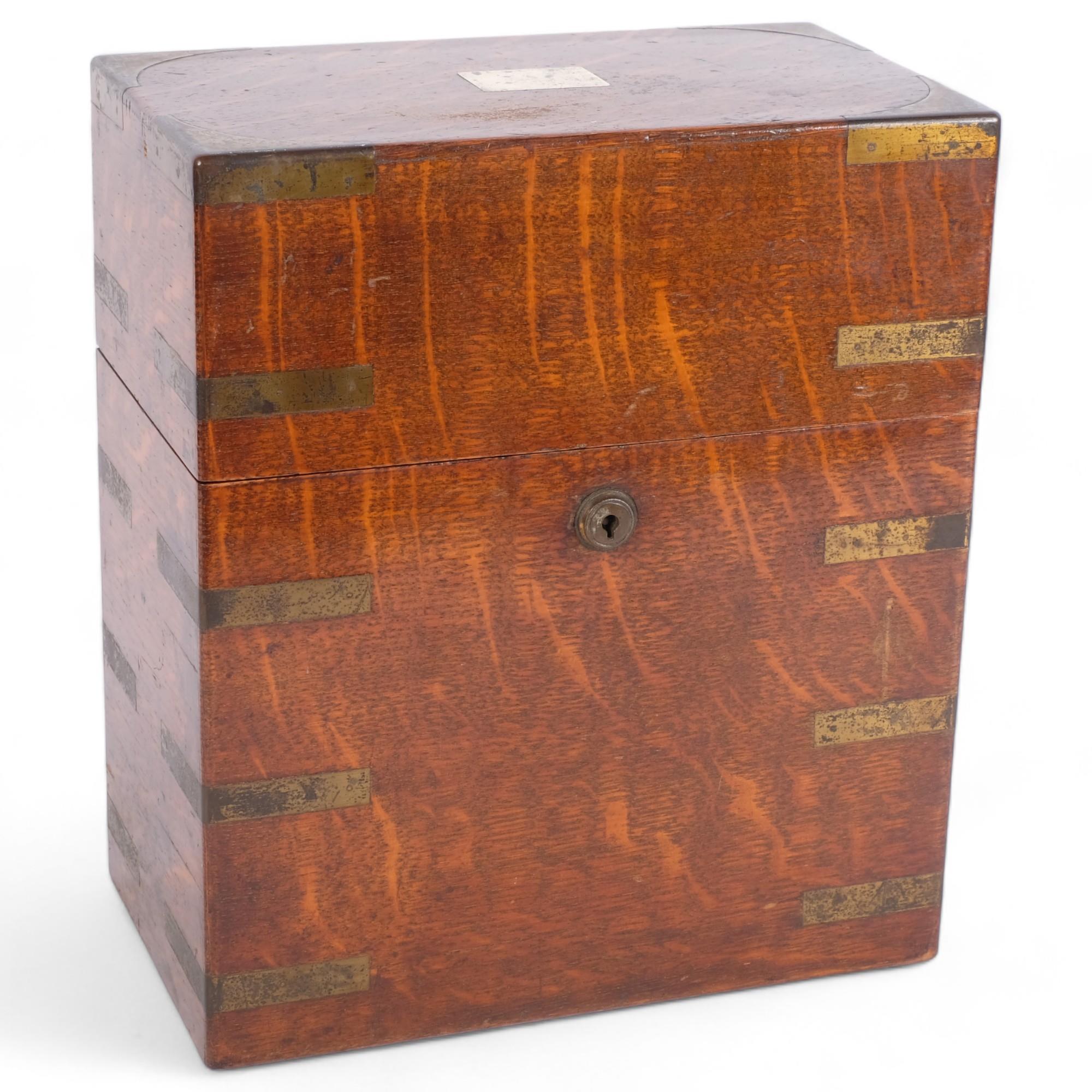 A brass-bound oak decanter box, retailed by Army & Navy, H28cm