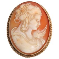 A relief carved cameo, portrait of a lady, mounted in a 9ct gold rope twist mount, L47mm