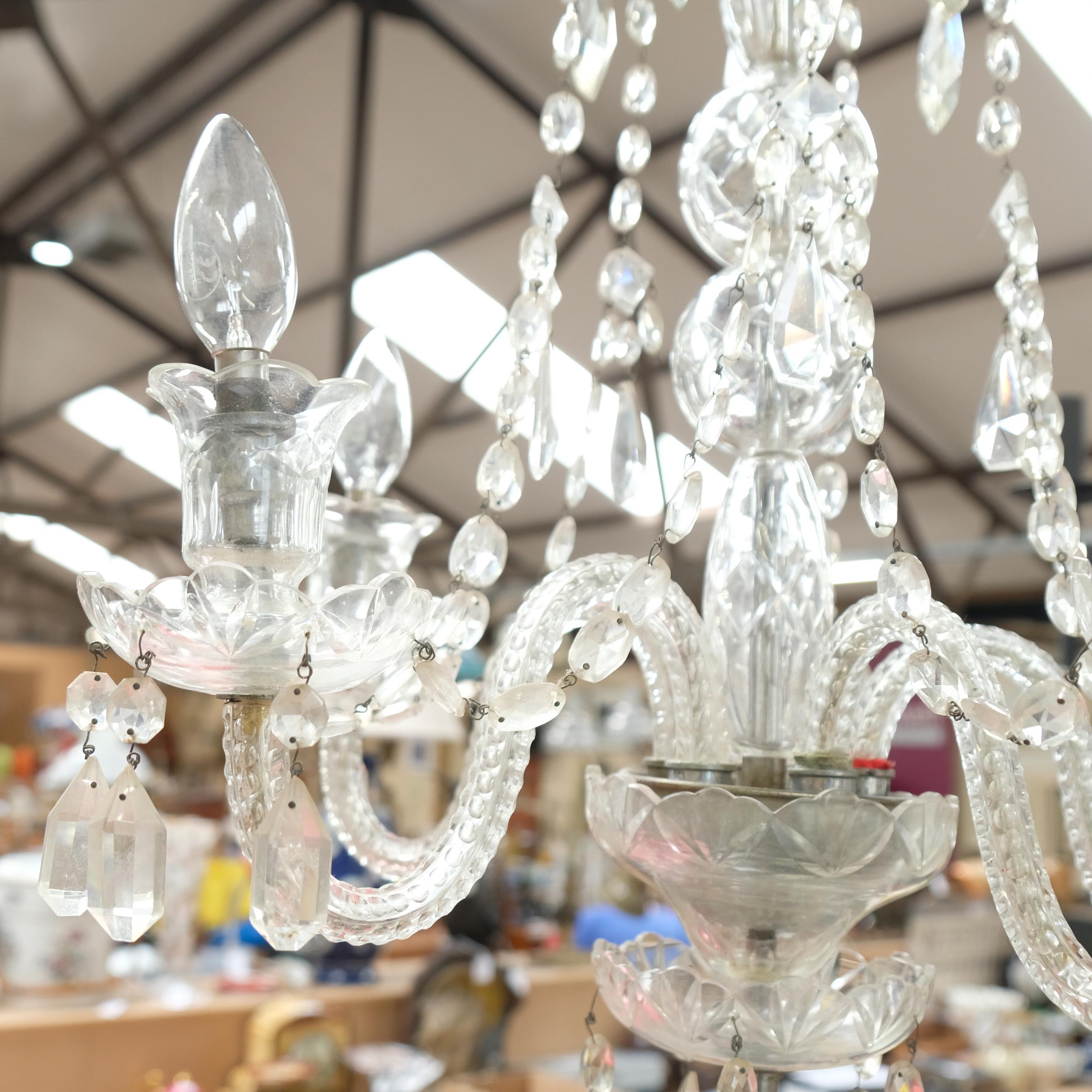 A large 5-branch glass chandelier, with bell-shaped associated glass lustres, drop approx 75cm - Image 2 of 2