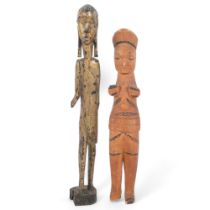 A Nigerian carved wood Ibibio doll, and a carved and giltwood Lobi figure, tallest 34cm