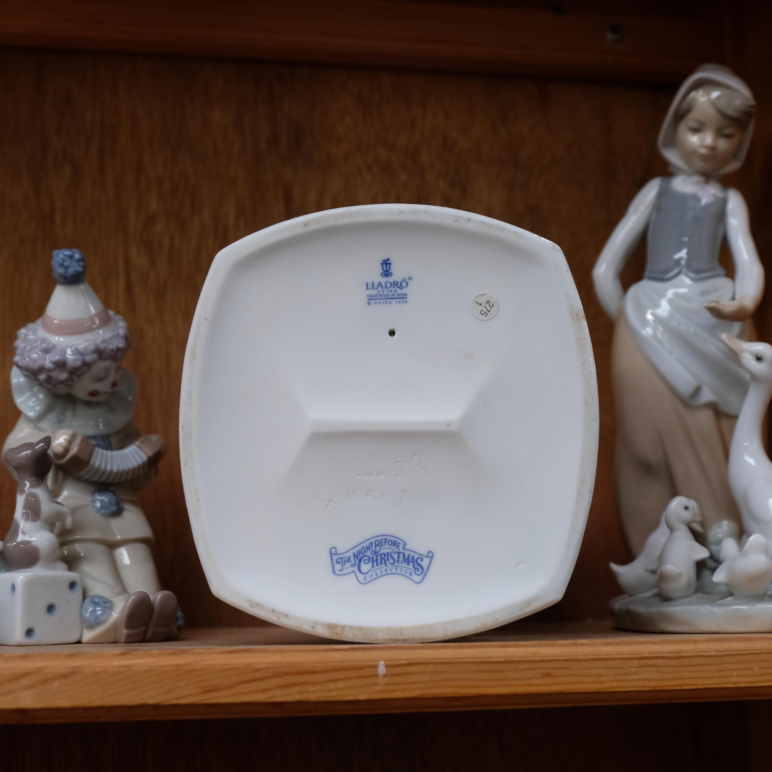 4 pieces of Lladro, including Christmas Collection, child in an armchair, H16.5cm, 2 clowns, and a - Image 2 of 2