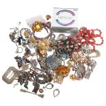 A box of various costume earrings, brooches, necklaces, including some silver