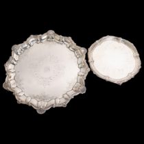 A large silver plated salver of shaped form, with scrolled and engraved decoration and monogram,