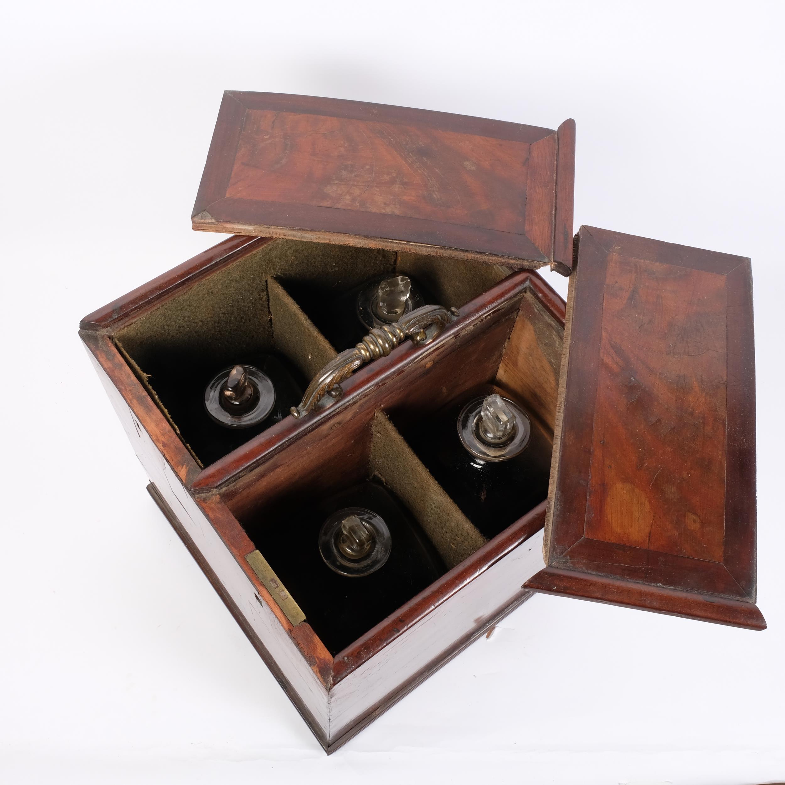 A large George III mahogany 4-bottle decanter box, with 2 sliding lids and brass carrying handle, - Image 2 of 2