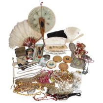 A box of various costume jewellery, including chains, various necklaces, leaf brooch, also including