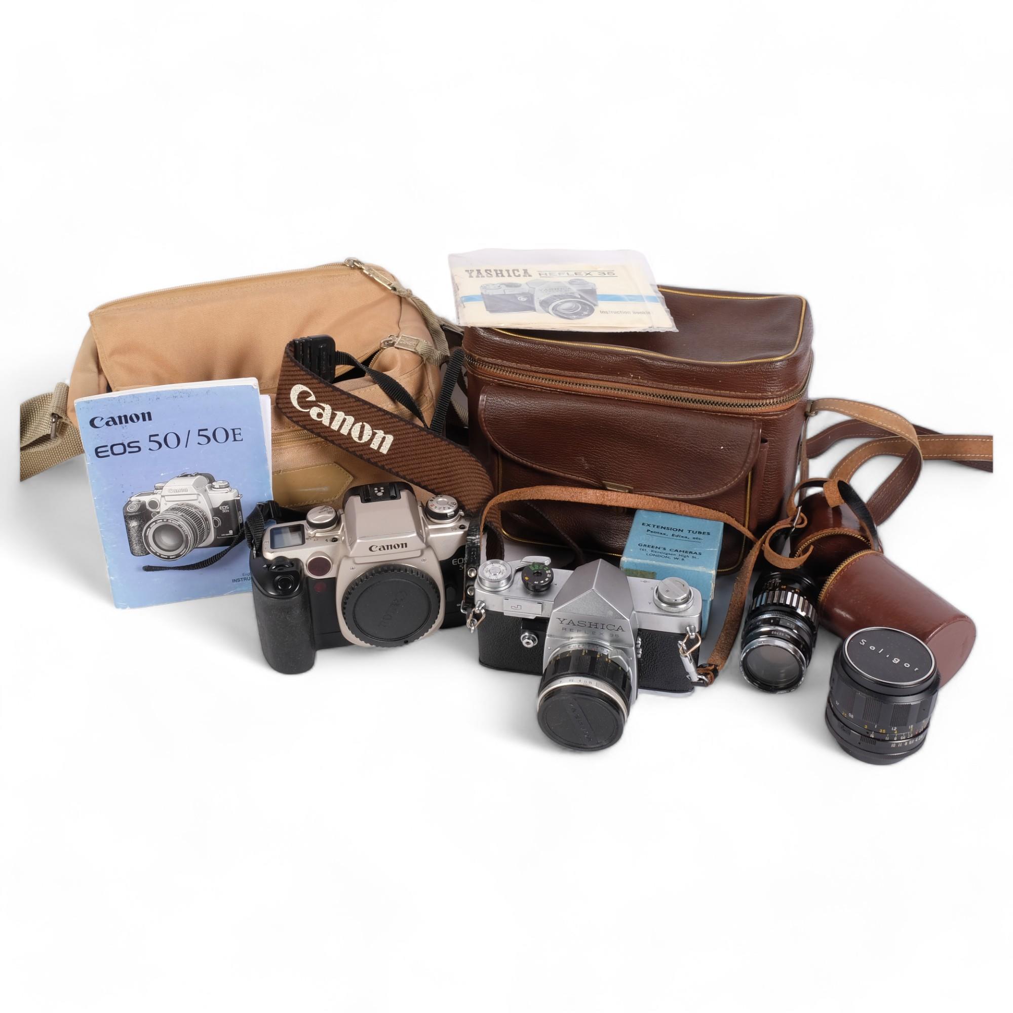 A Canon E0S 50 digital camera, in associated softshell carry case, with various ephemera and