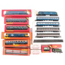 A quantity of Hornby OO gauge scale locomotives, carriages, etc, including R.075 British Rail