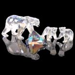 A Swarovski Siku polar bear, L15.5cm, together with 2 cubs and rock marked Siku to 2011, (4) The