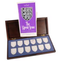 The Royal Arms, a cased set of 12 sterling silver ingots, each depicting 1 of the 12 Royal Coat of