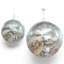 A large Vintage disco glitterball, diameter approx 40cm, and a second smaller disco glitterball (2)