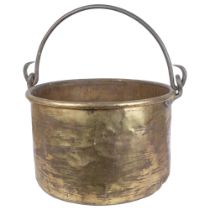 A large Victorian brass swing-handled fireside bin, diameter 52cm, height 30cm