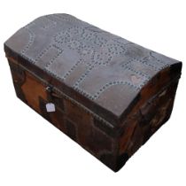 A Vintage wooden and studded leather domed trunk, label to the inside reads Francis Thomas Sadler,