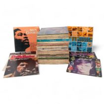 A quantity of vinyl LPS and 12" singles, various artists and genres, including Shirley Bassey, Des