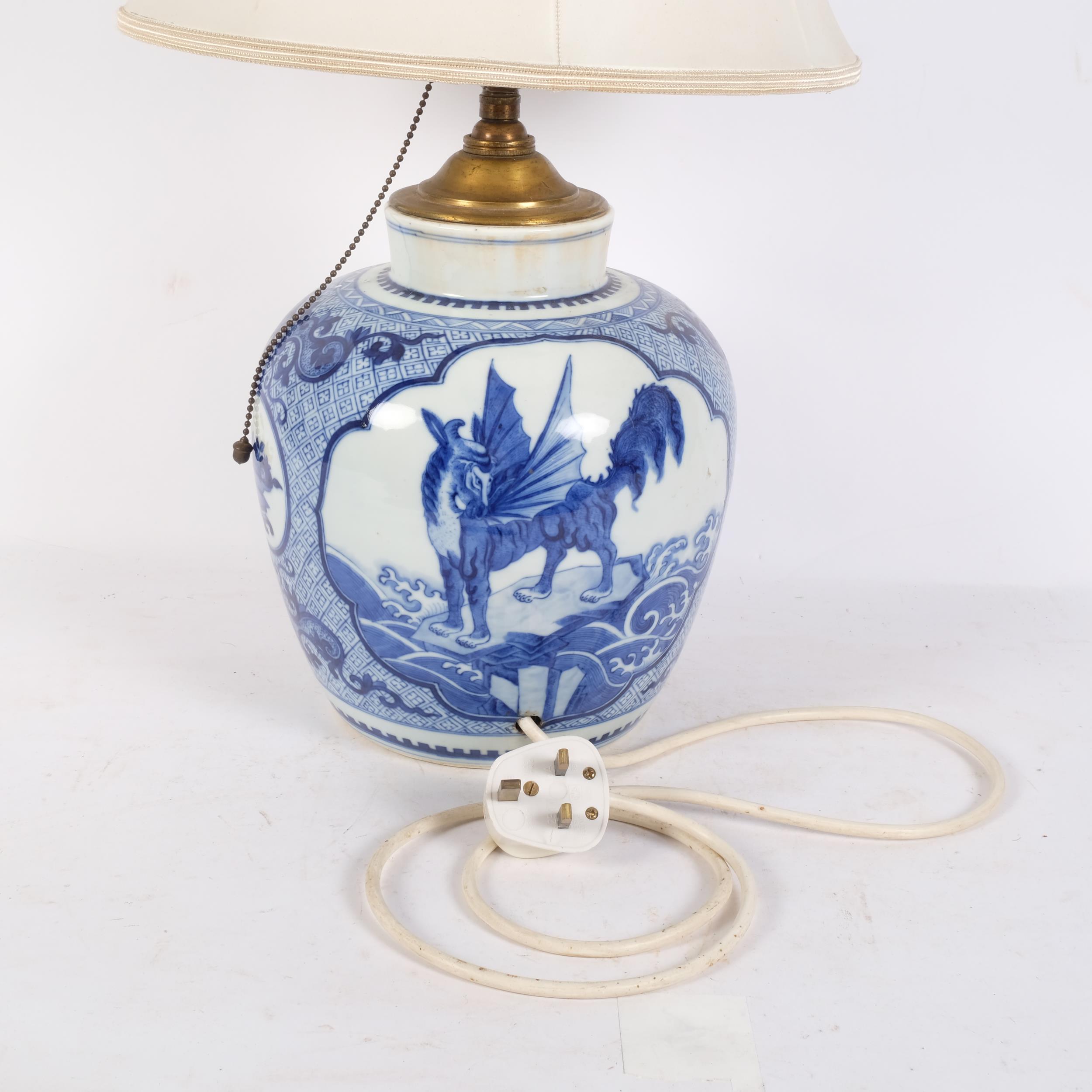 A large Chinese blue and white vase, printed decoration, H24cm, which has been drilled to use as a - Image 2 of 2