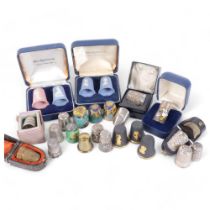 A collection of silver and other thimbles, including a cased Wedgwood Jasperware, etc (11 silver)
