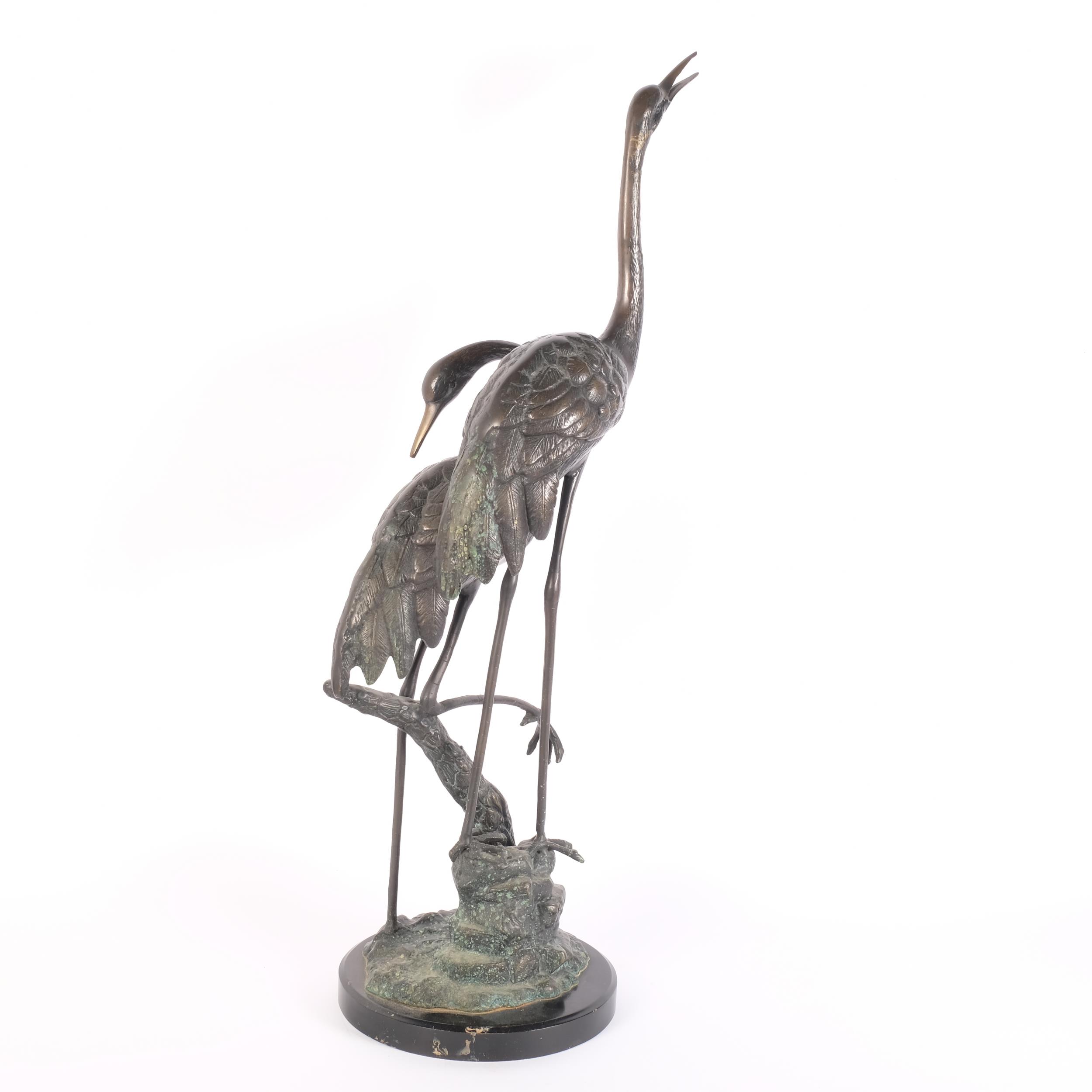 A pair of verdigris bronze cranes on naturalistic base and metal stand, H75cm, base width 20cm - Image 2 of 2