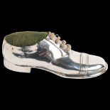 An Edward VII silver shoe design pin cushion, L12cm, hallmarks for Chester 1909, maker's marks