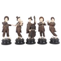 Unusual set of carved wood and bone musicians, on wooden plinths, cellist height 17cm