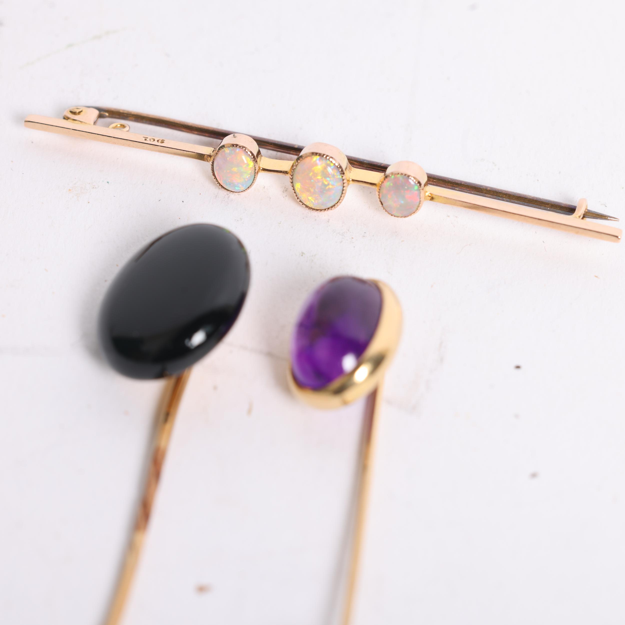 A group of gold jewellery, including a 9ct gold and opal set bar brooch, an 18ct gold and cabochon - Image 2 of 2