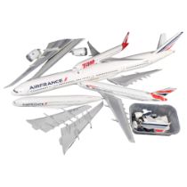 A selection of plastic model aeroplanes, including a British Airway Jumbo Jet, Air France