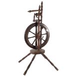 An elm and beech spinning wheel with turned spindles, H99cm