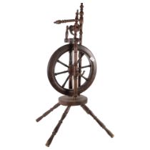 An elm and beech spinning wheel with turned spindles, H99cm