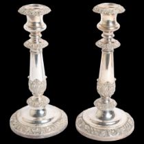 A pair of Antique silver plate on copper candlesticks, with embossed acanthus leaf decoration, H26cm
