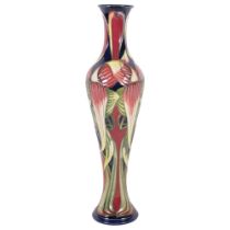 A Moorcroft "Trinity vase", by Philip Gibson, numbered 524, 31.5cm Good overall condition, no