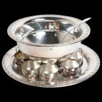 ONEIDA - a large silver plated punch bowl with 12 cups and ladle, and matching engraved circular