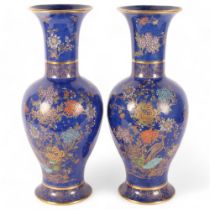 A pair of Carlton Ware "Kang He" baluster vases, blue ground in Rockery & Pheasant pattern with
