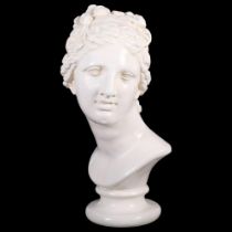 A plaster Classical bust of a lady with braided hair, H41cm