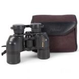 A pair of Nikon Action 8x40 field binoculars, in associated softshell case