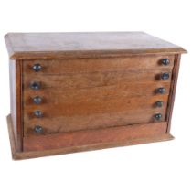 An Vintage Horologist/Clocksmith cabinet, table-top in nature, with 6 long drawers, 2 of these 6