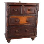 A Victorian apprentice piece stained pine table-top chest of 2 short and 2 long drawers, with