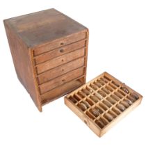 A wooden Horologist/Clocksmith's table-top wooden cabinet, with 6 drawers, drawers have sectional