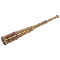 A reproduction brass 4-draw telescope