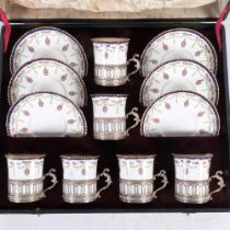 Edwardian Royal Worcester set of coffee cups in silver holders (Birmingham 1907 hallmarks) and