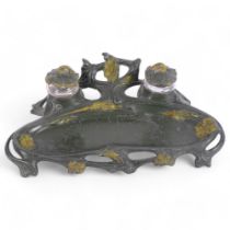 Art Nouveau painted pewter Continental desk stand, with inkwells and covers, and floral design, 30.