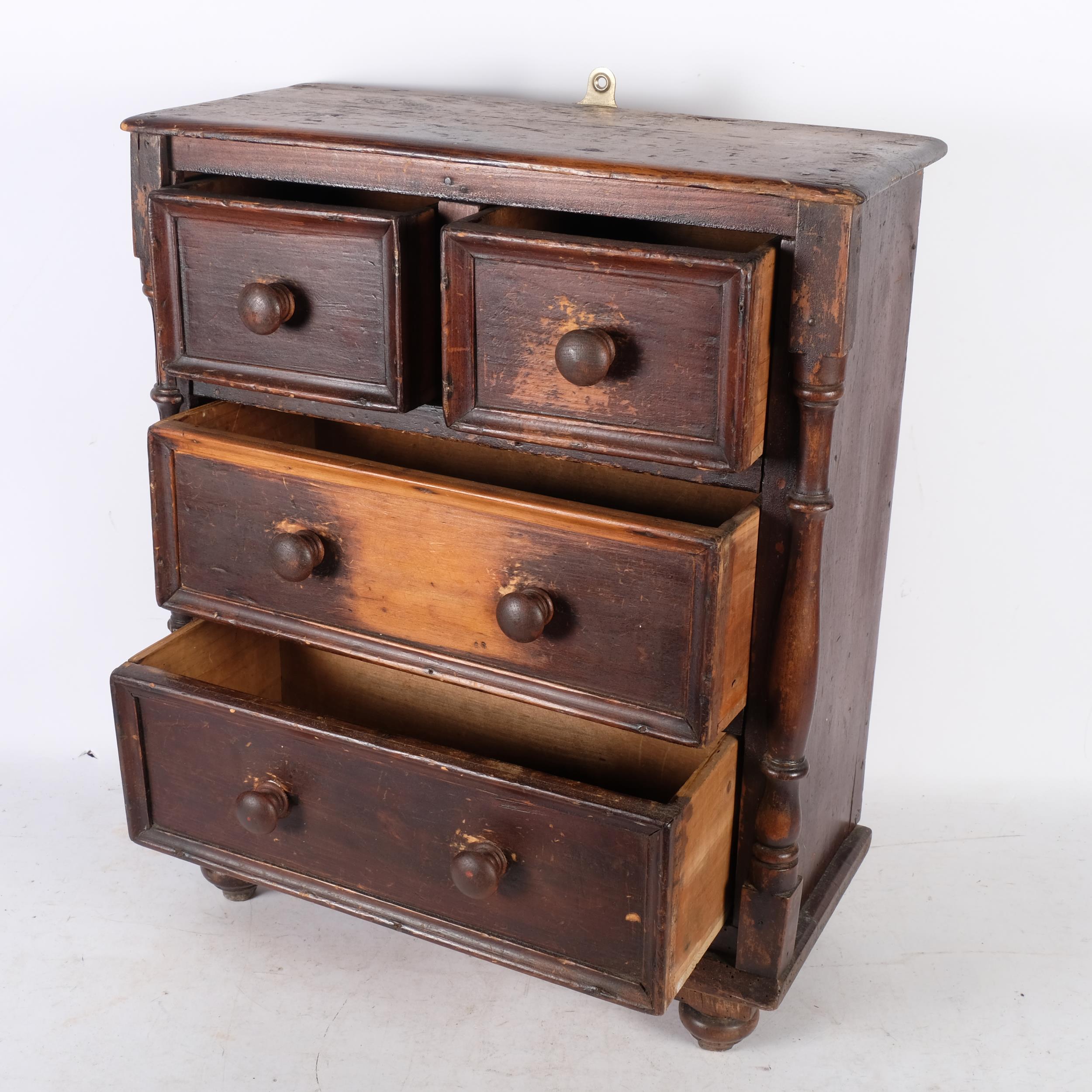 A Victorian apprentice piece stained pine table-top chest of 2 short and 2 long drawers, with - Image 2 of 2