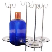 4 Vintage chrome stands, and a large blue glass apothecary bottle