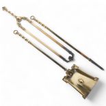 A 3-piece Arts and Crafts brass companion set, longest piece 57cm