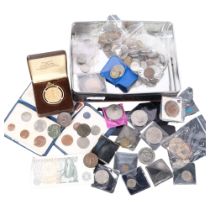 A tin of pre-decimal English and Continental coins, cased commemorative coins, including some silver