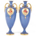 A pair of Victorian Royal Worcester 2-handled baluster vases, powder blue ground with hand painted