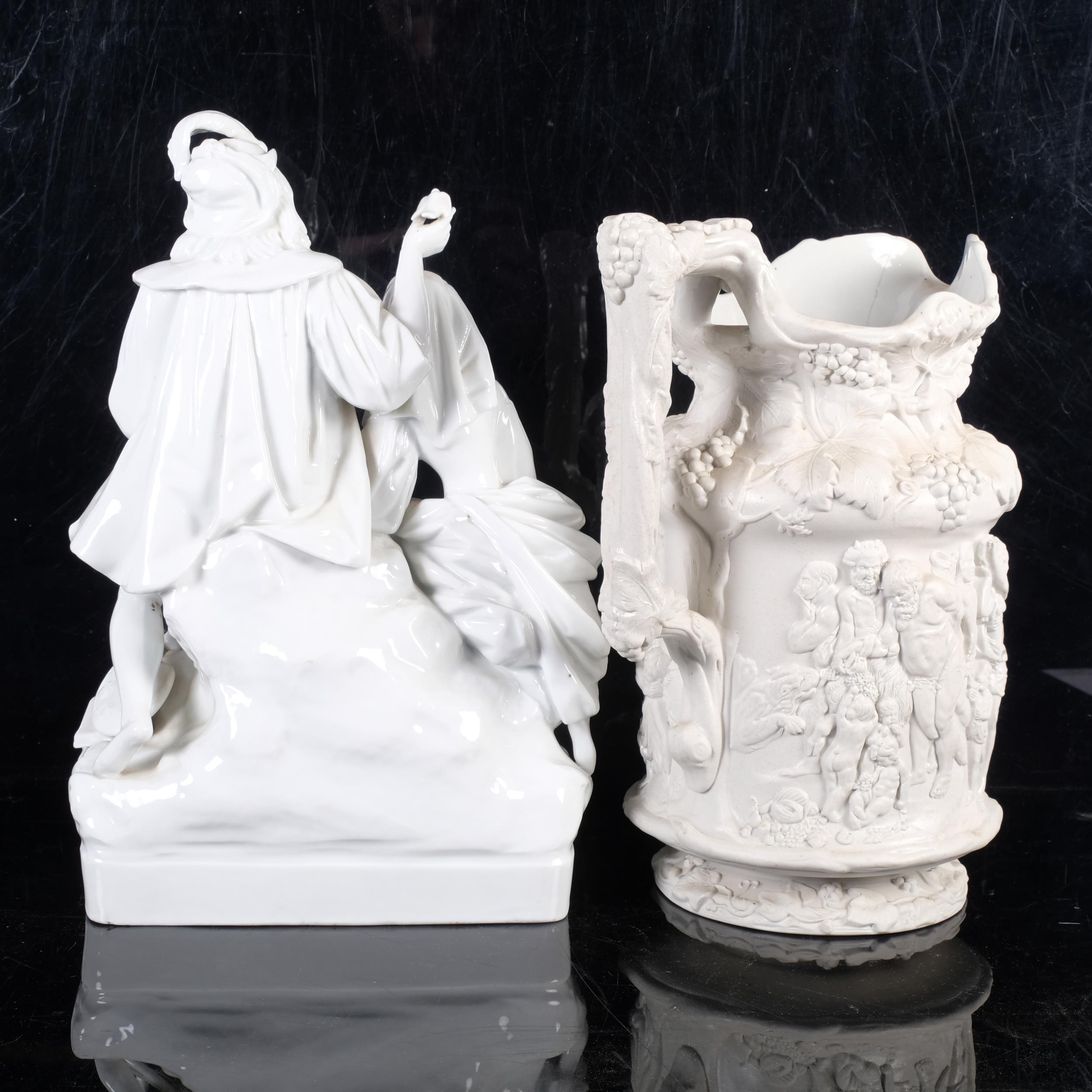 A Continental porcelain group, male and female artisan figures, seated on rock with bird cages on - Image 2 of 2