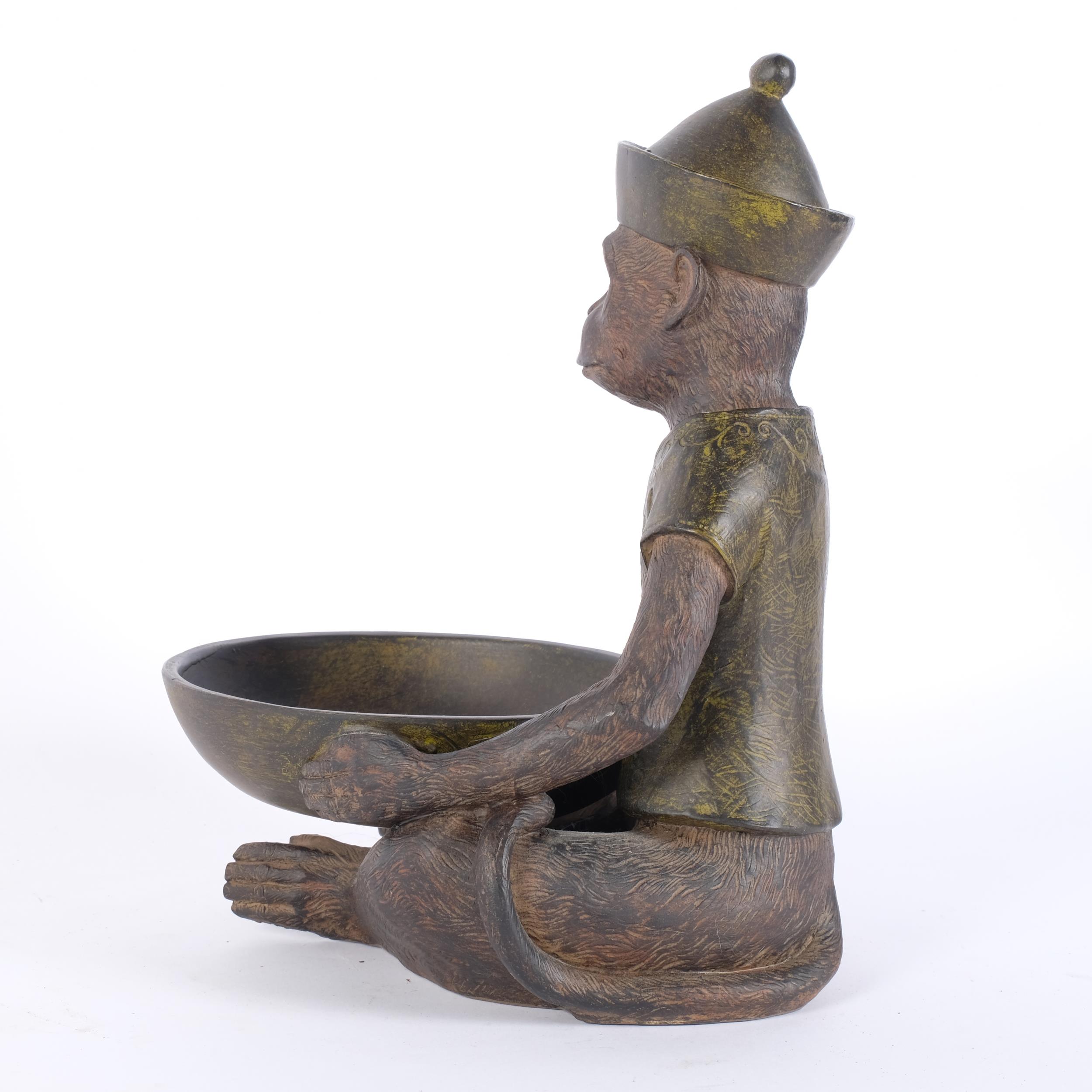 A painted composite study of a monkey with begging bowl, H28cm - Image 2 of 2