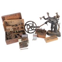 A selection of Vintage horologist's or clocksmith's tools and associated accessories, including
