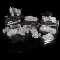 A collection of boxed moulded glass vehicles, including a Tonka cement mixer, a racing car, all by